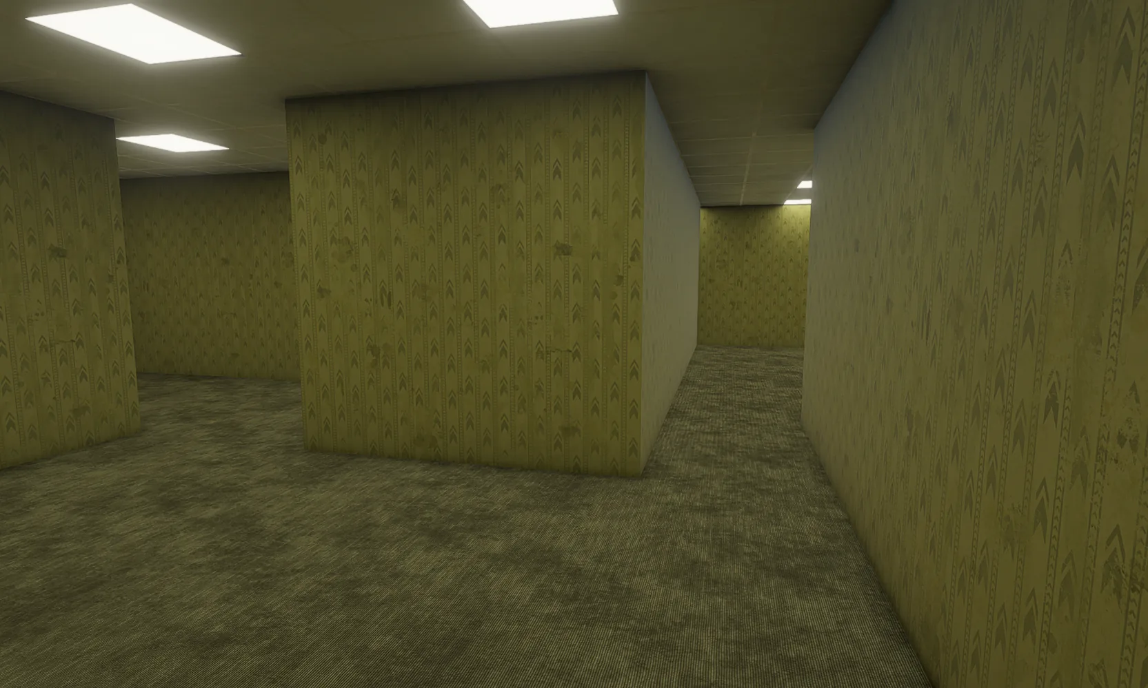 Close view of chevron wallpaper and stained carpet between maze walls